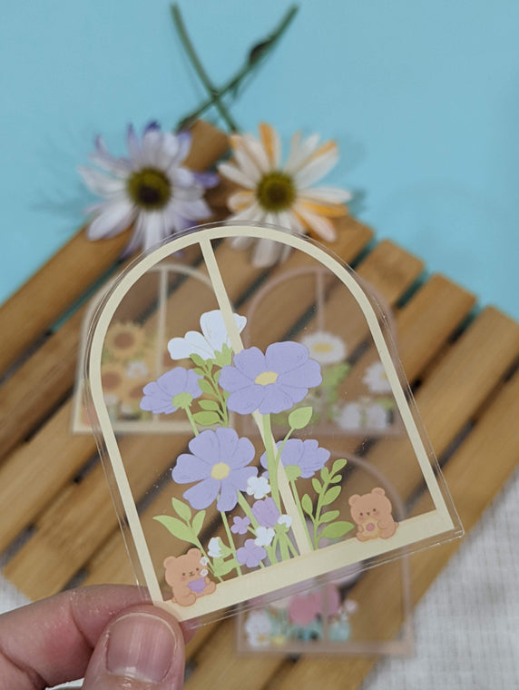 BY THE WINDOW CLEAR STICKER