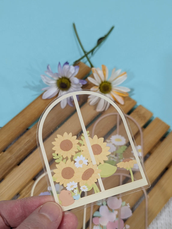 BY THE WINDOW CLEAR STICKER