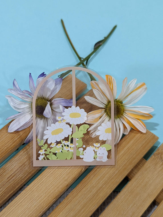 BY THE WINDOW CLEAR STICKER