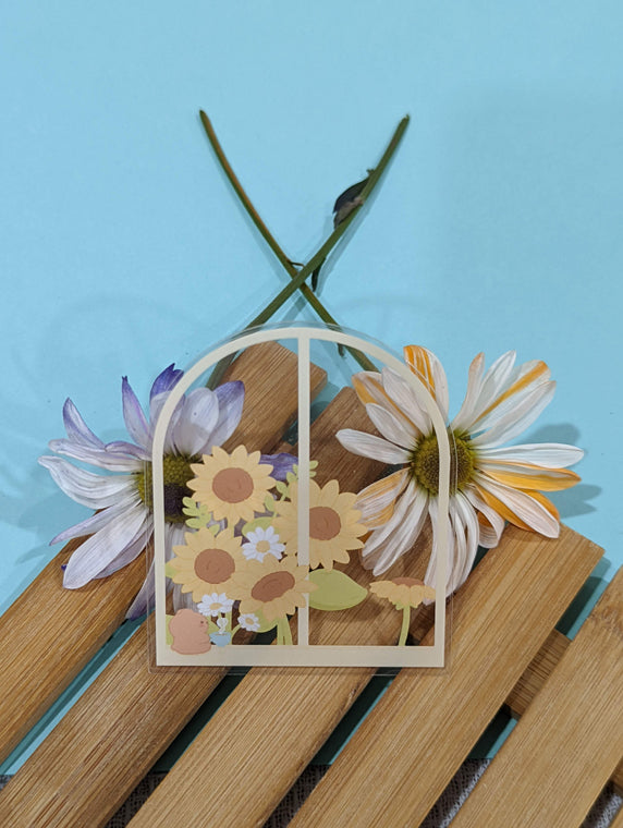 BY THE WINDOW CLEAR STICKER